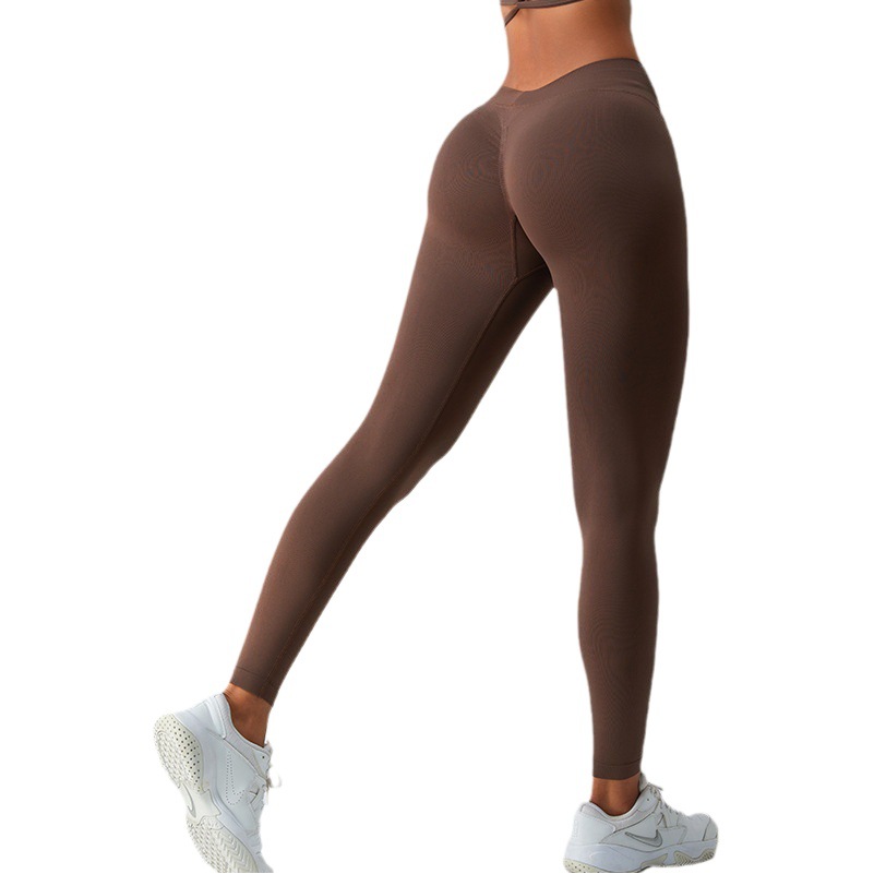 Transfronterizo nuevos pantalones de yoga de cintura en V sin costuras pantalones de melocotón de elevación de cadera de cintura alta para mujer pantalones de fitness deportivos ajustados de secado rápido