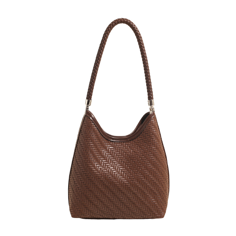 Transfronterizos retro bolsas de cubo de gran capacidad 2025, otoño y invierno nuevo sentido de alta calidad tejido bolsas de brazo de mujer de viaje al hombro