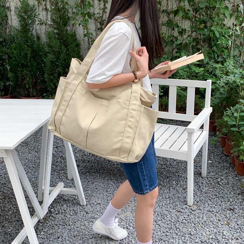 Estilo coreano casual color sólido Internet celebridad moda bolsa de tela simple moda de gran capacidad todo fósforo de las mujeres solo hombro bolsa de lona
