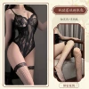 Black [lace jumpsuit] + black fishnet stockings