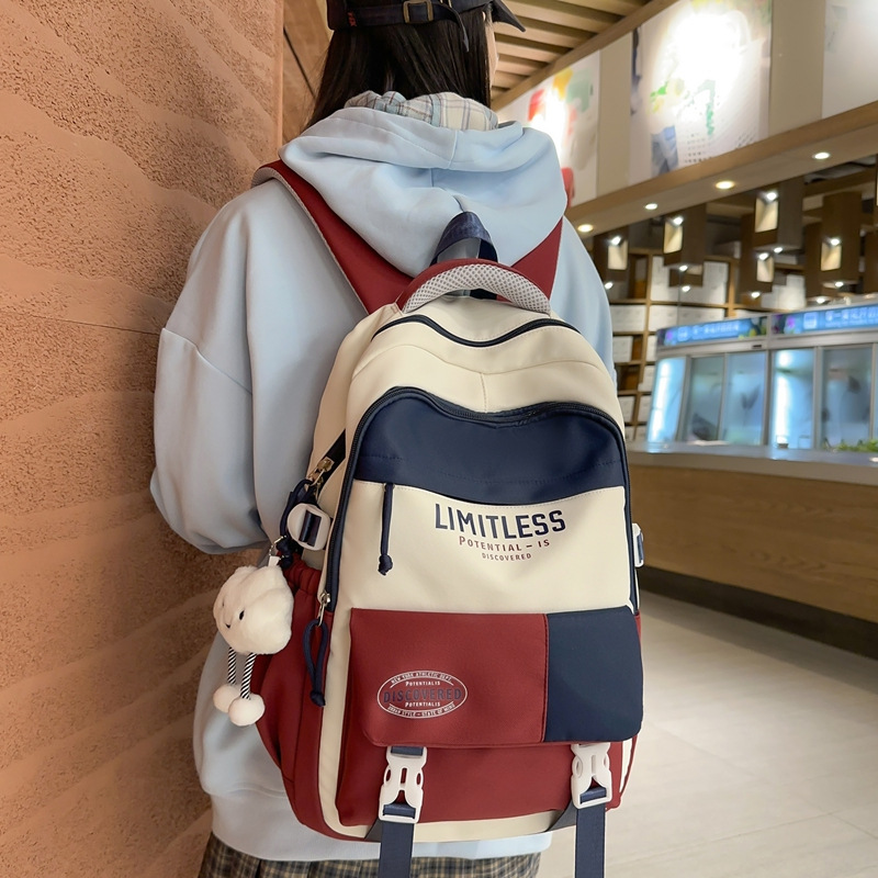 Mochilas escolares de alto valor facial nuevas estudiantes de primavera 2025 moda ligera y viajes al aire libre de gran capacidad con bolsos de hombro