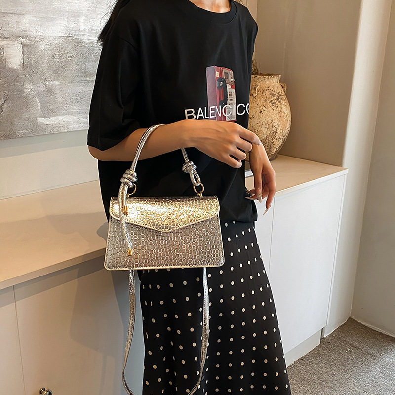 Cara brillante simple y elegante bolso coreano de nudo 2024, nuevo estilo extranjero, bolso de alto valor, bolso pequeño.