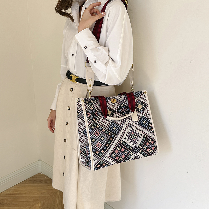 Gran capacidad lona Plaid Portátil Bolsa femenina 2024 transfronteriza primavera nuevo trabajo viajero hombro bolsa de mensajero