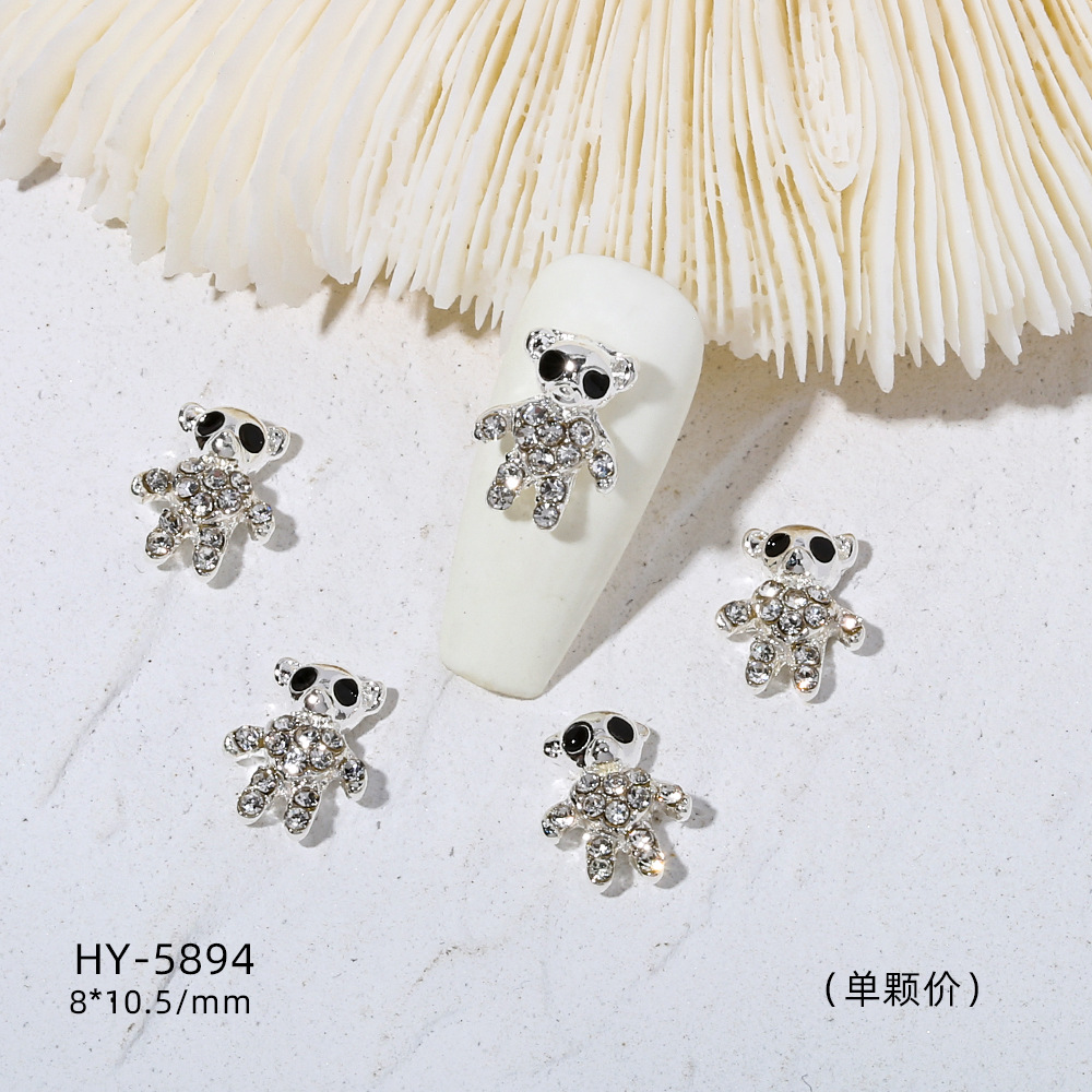 Venta caliente taladro de uñas arco de plata joyería tridimensional flash diamante esmalte de uñas decorativo diamante acabado pieza de uñas traje de joyería