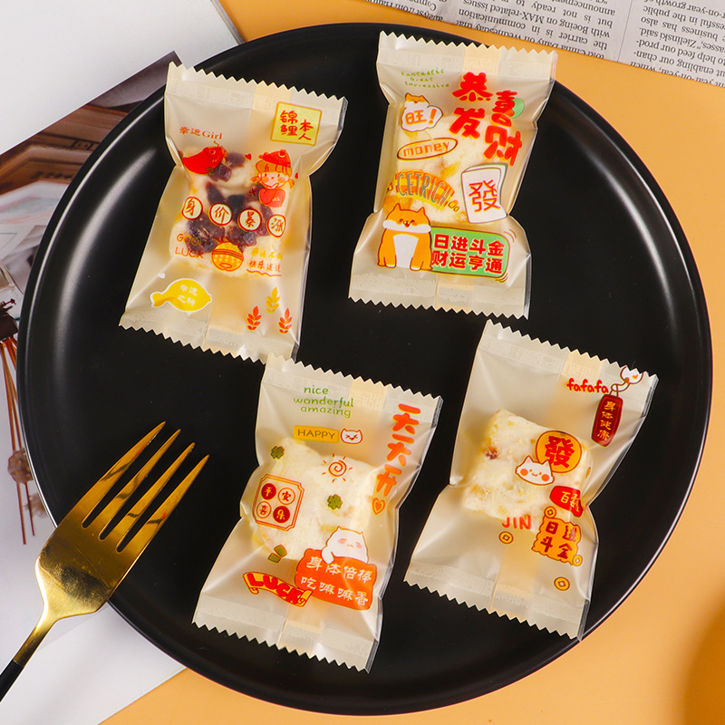 Nuevo copo de nieve crujiente bolsa de embalaje máquina sello hornear transparente Galleta de carne de vacuno bolsa de dibujos animados leche azufaifo bolsa de embalaje al por mayor