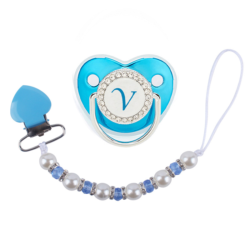 Nuevo bebé suministros melocotón corazón clip de hierro calmante bebé perla cristal chupete cadena anti-gota cadena chupete traje