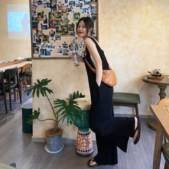 氷の糸の広腿のズボンの女性の新型の夏の垂感の背もたれの連体のズボンはゆったりしていて、薄いタイプの香港風のカジュアルな長いズボンを現します。