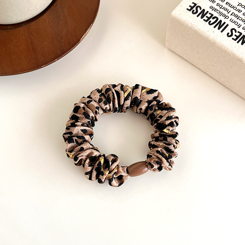 Temperamento europeo y americano estampado leopardo anillo de cabello simple de alta elástica cuerda de cabello gruesa cuerda de cabello de bolas duradera correa