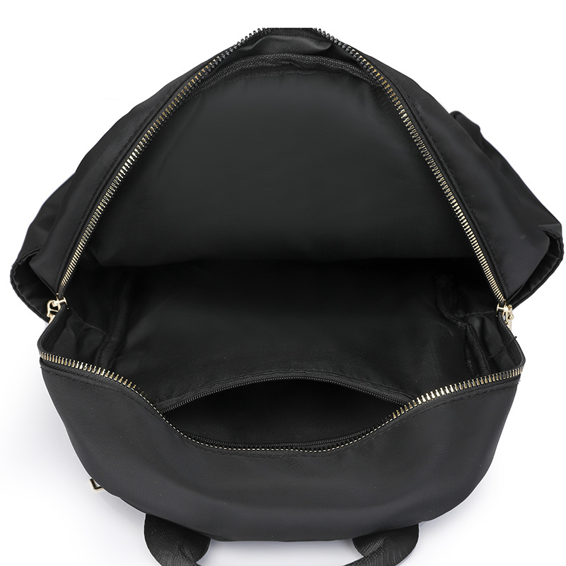 Mochila de tela Oxford para mujer 2024 nueva moda mochila de todo fósforo diseño de nicho mochila de viaje de viaje