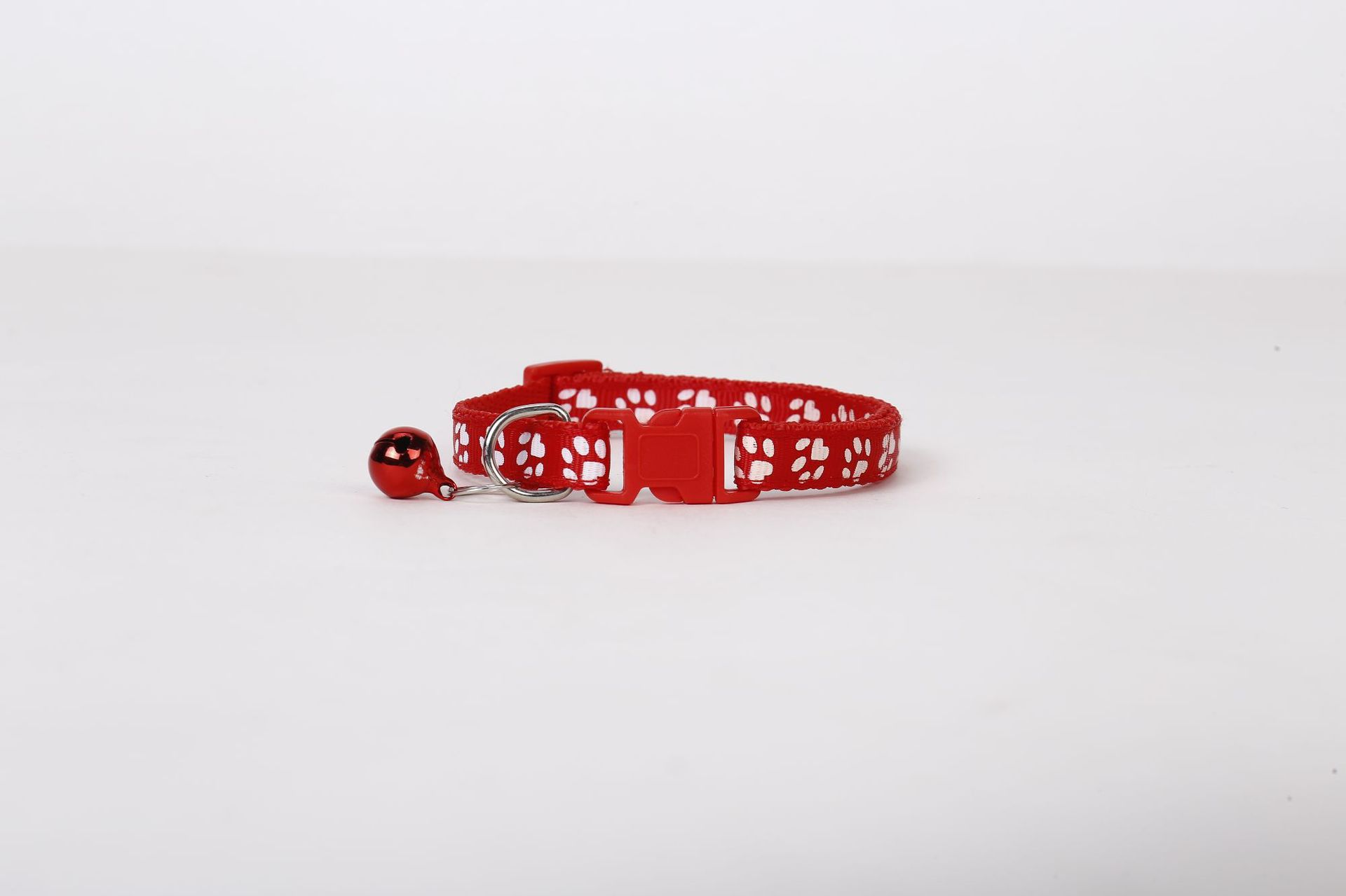 Collar de pegado de mascotas perros gatos una sola huella de pata impresa campana gatos brota gatito de nylon
