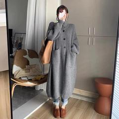 韓系の怠惰な風の高い襟のセーターの女性の単列は純色の長袖のニットのカーディガンの中で長いタイプのコートの女性の春秋を掛けます。