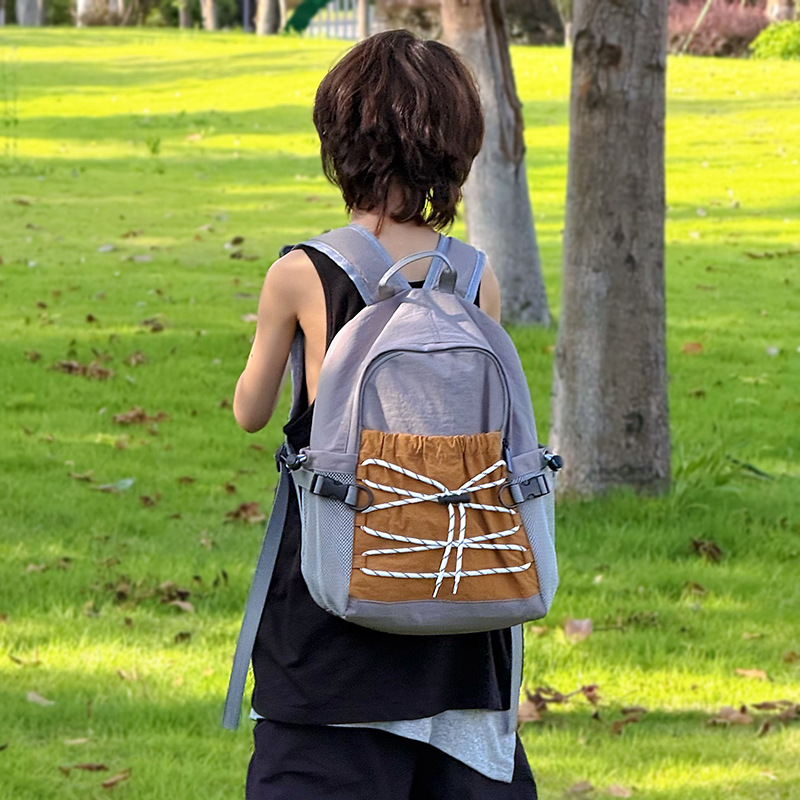 Mochila escolar de gran capacidad de ocio de deportes al aire libre mochila para niños y niñas con cuerda de dibujo de color contraste mochila para niños