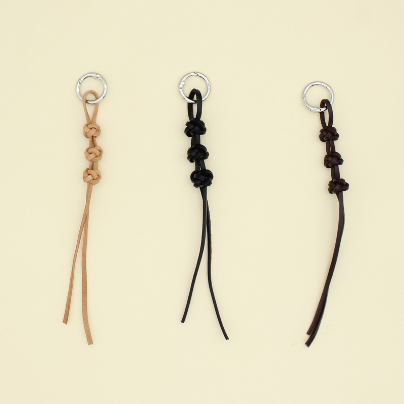 New Simple Hand-Woven Cowhide Rope Creative Keychain Bag Pendant Jewelry Xiaohongshu Hot Style Wholesale