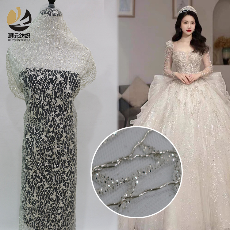 Fabricantes promocionales de bajo precio blanco polvo bordado esquinilla hilo de encaje de plata pulverizado oro vestido de boda tela