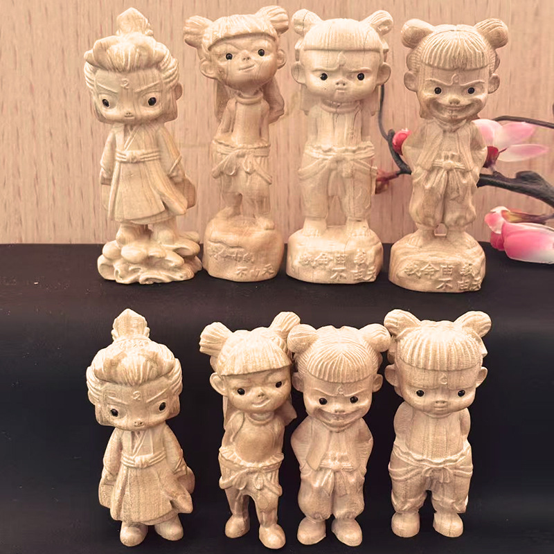 哪吒桃木摆件批发三太子魔童闹海木雕刻手把件可爱文玩实木工艺品