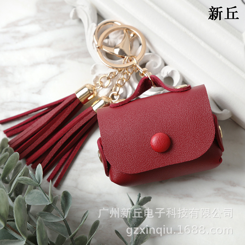 Funda de cuero con borlas de venta directa de fábrica, adecuada para los nuevos auriculares Apple Airpods.