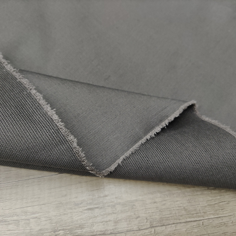 Fábrica al por mayor suave textil de ropa de color sólido 100% algodón material de ropa tela