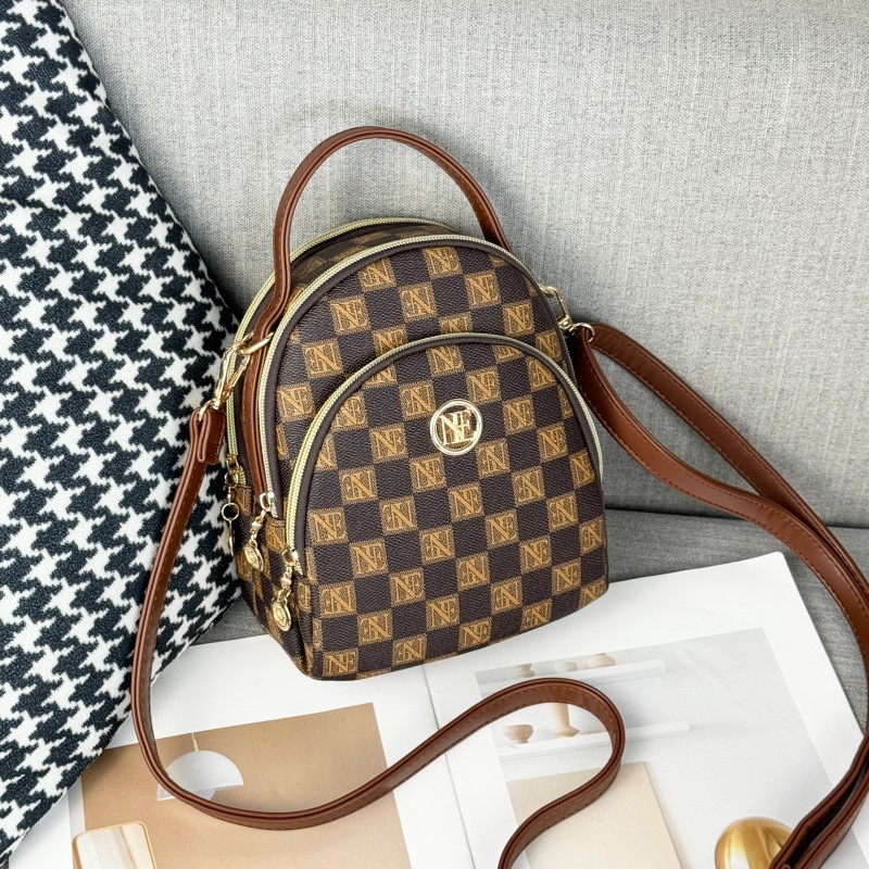 Guangzhou Hengli 2024 nueva moda mochila pequeña bolso de mano bolso de teléfono móvil madre de mediana edad bolso de mensajero de tres usar