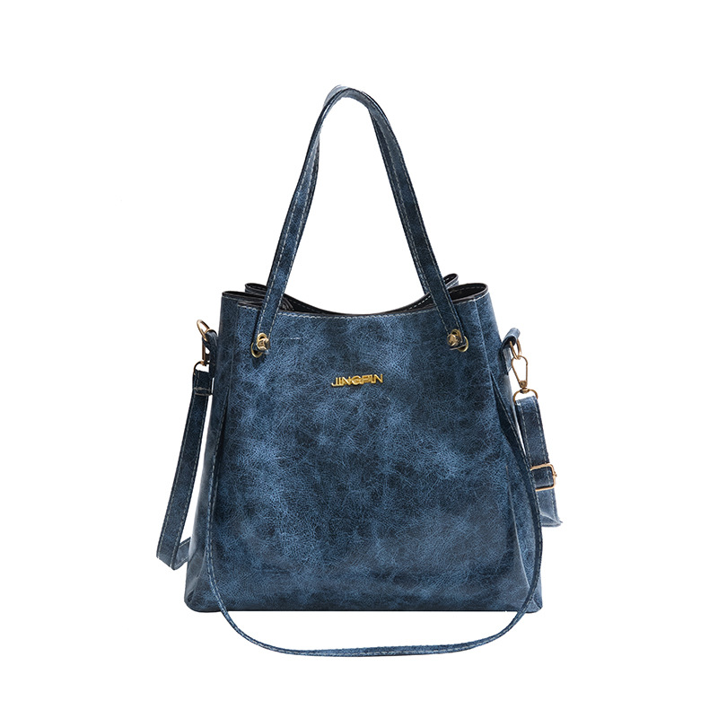 Mochila de moda de cuero suave de gran capacidad 2025, primavera nueva bolsa de hombro de viaje, bolso de mano de cuero retrógrado para mujeres