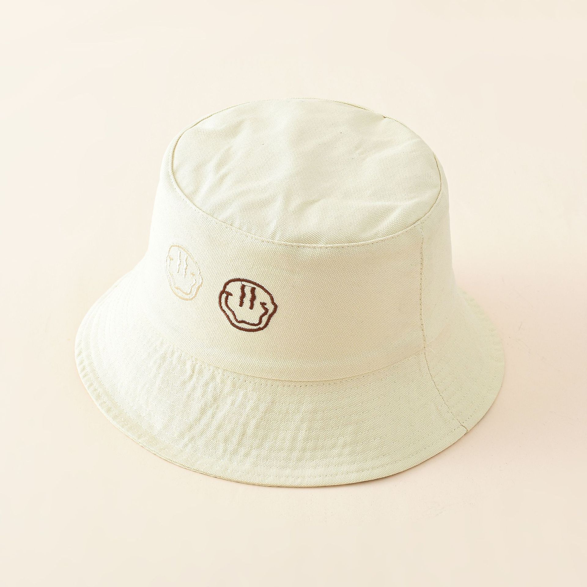 Sombrero de pescador de cara sonriente de doble cara para mujer primavera y verano estilo coreano bordado de moda lindo sombrero de lavabo a prueba de sol sombrero pequeño a prueba de sol para mujer