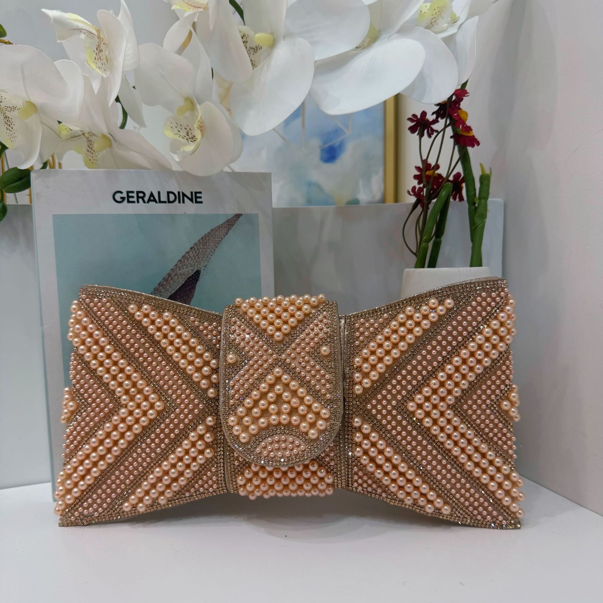 Bolsa de cena de damas transfronterizas, bolsa de mano de lujo ligera, perlas de diamante, bolsa de cena de arco inclinada de hombro único