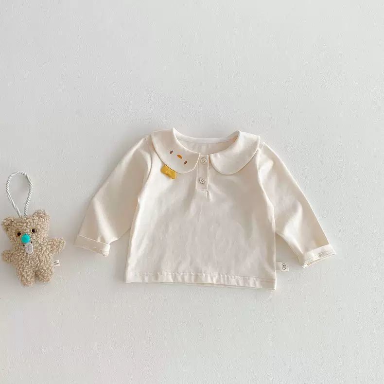 春と秋の女の子の子供服のtシャツの赤ちゃんの洋気の子供の個性の潮のかわいい漫画の耳のストライプの子供の襟の底のシャツ