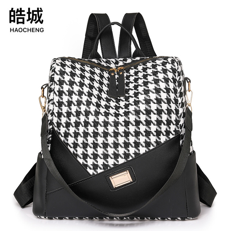 Fábrica al por mayor 2024 nueva mochila antirrobo de color de contraste para mujer mochila de viaje multiusos multifuncional de nailon simple