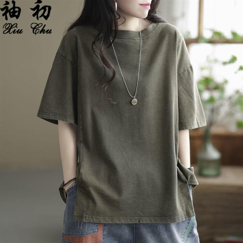 Tシャツの女性の夏服の新型半袖のゆったりとしたレトロな純色の百合はやせている服のtシャツの上着を見せます。|undefined