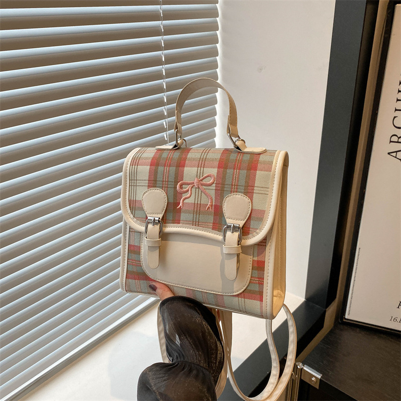 Wimei mochila 2024 nuevo estilo de diseño de moda nicho de viaje bolsas escolares ligeras para mujeres ins fuera mochila pequeña