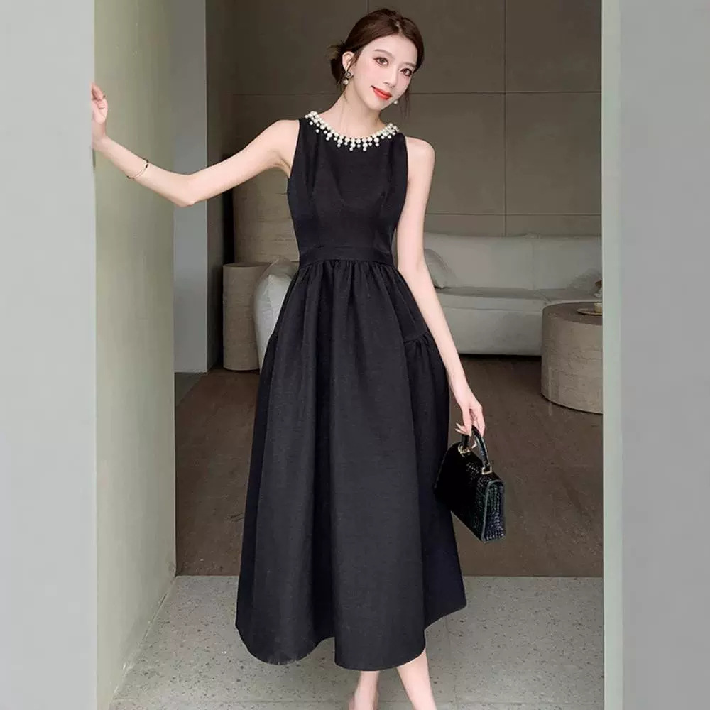 Europa estación chaleco negro vestido de mujer verano lujoso ligero Hepburn vestido de noche con perlas de estilo de alto rendimiento vestido largo