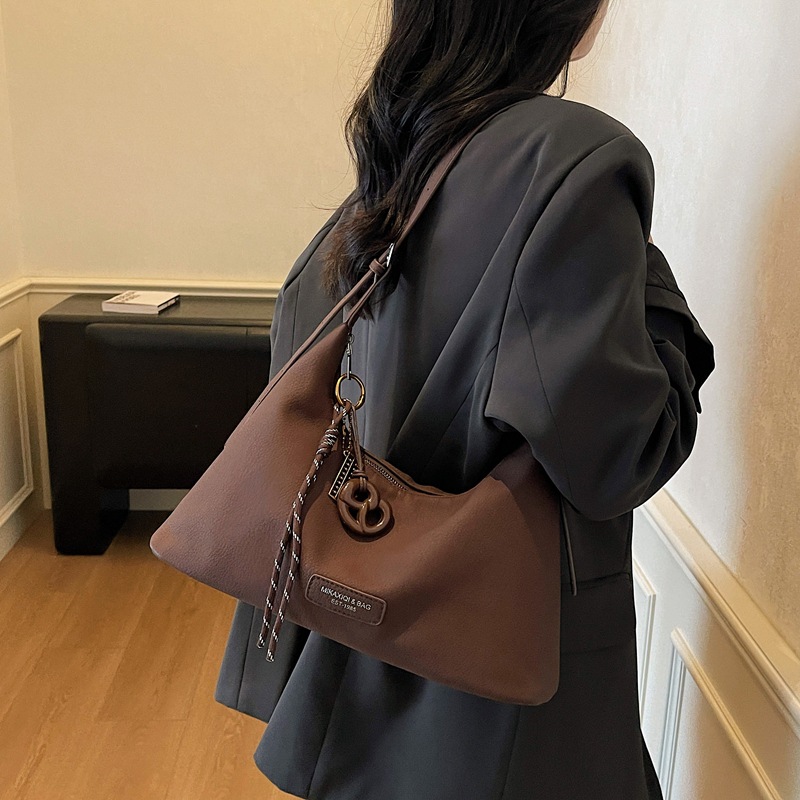 2025 nueva moda retro bolsas de brazo bolsas de viaje de mujer bolsas de mano de gran capacidad bolsas de mano bolsas de hombro simples y versátiles