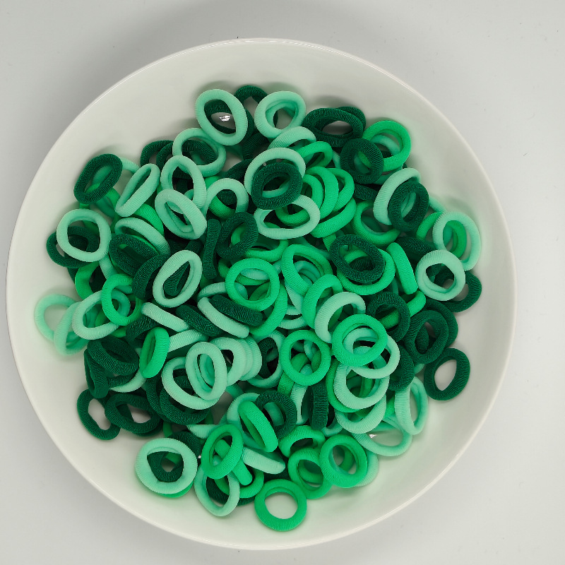 Color de caramelo de alta elasticidad pequeña toalla anillo de cabello bebé anillo de cabello no daña cabello atado fábrica de cabello al por mayor