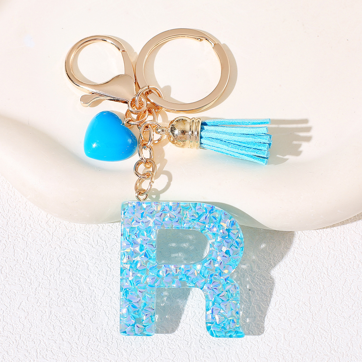 Nuevos productos azules de amor con frascos de letras lindos enclavadores decoraciones europeas y americanas populares llaveros damas