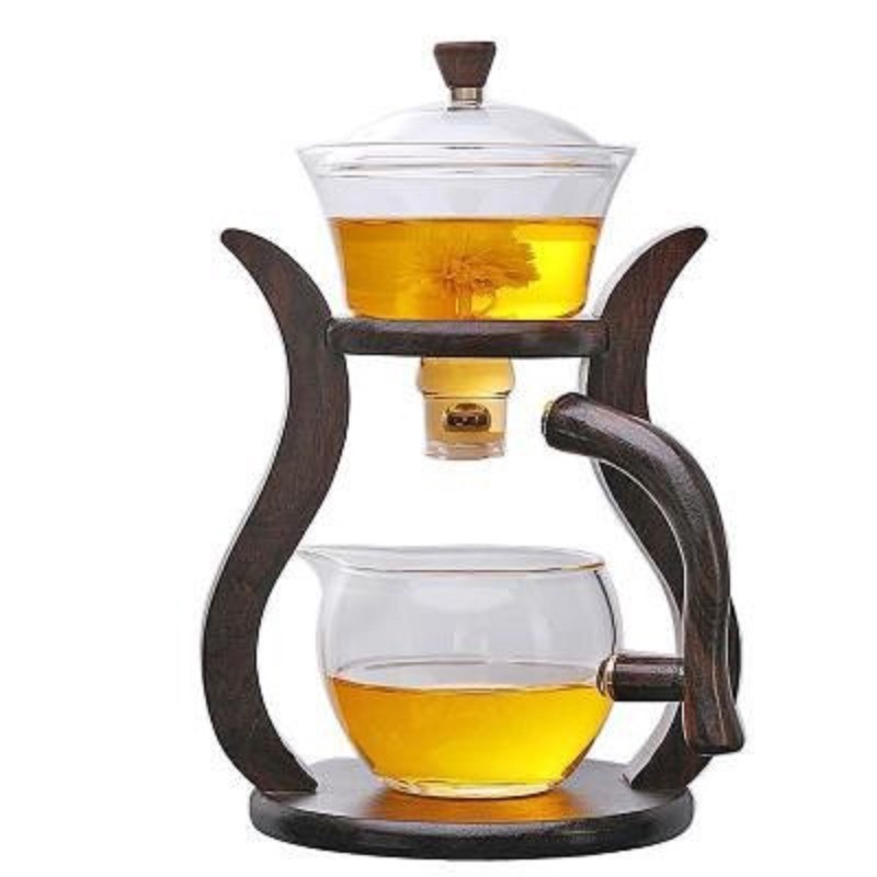 Fábrica al por mayor Palacio lámpara juego de té de vidrio borosilicato fabricante de té perezoso Kung Fu juego de té traje de succión magnética juego de té