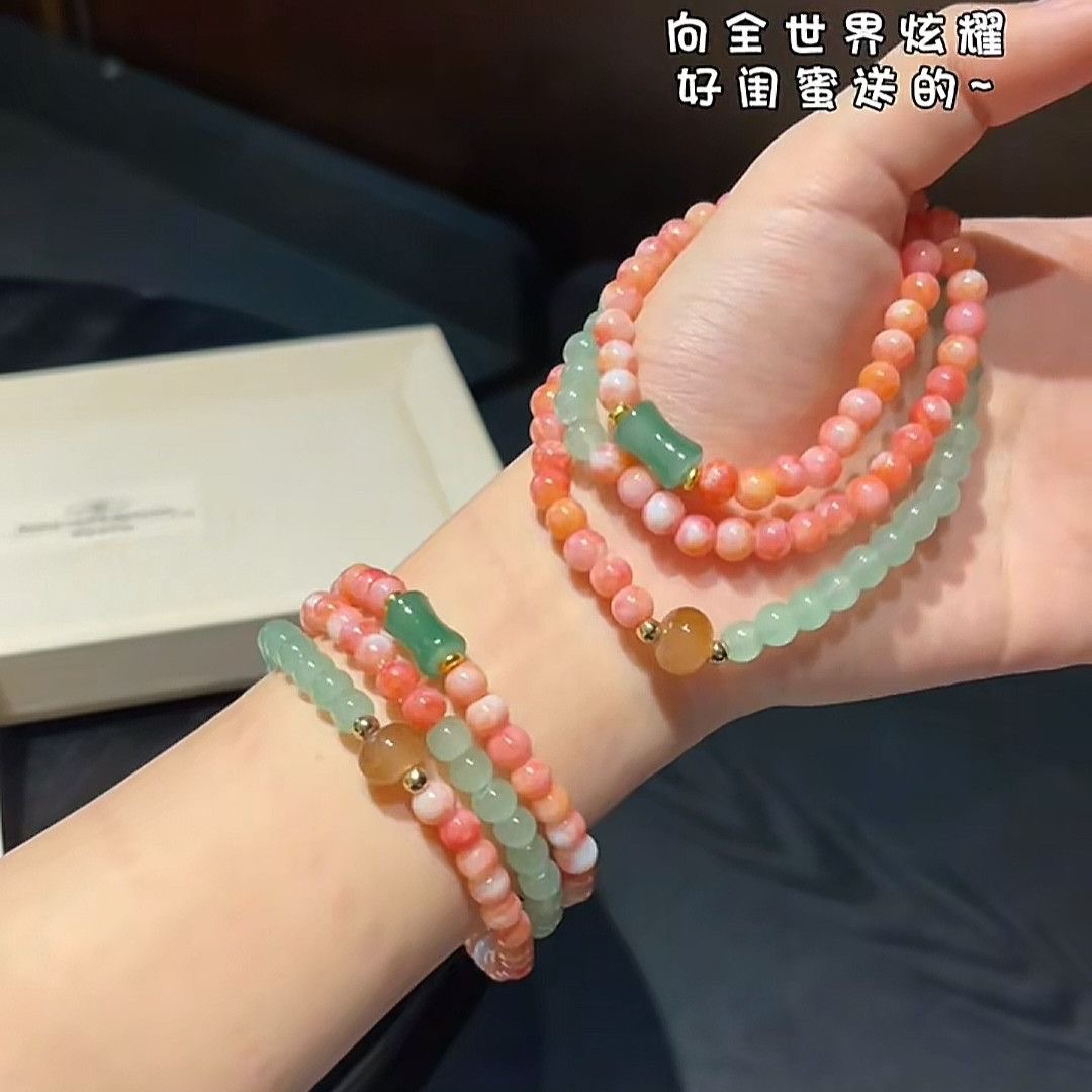 Nuevo estilo chino de pulsera de cuentas de múltiples anillos, estilo de mujer, pulsera de lujo ligera, pulsera de lujo sofisticada, pulsera rosa de nicho de alta calidad.