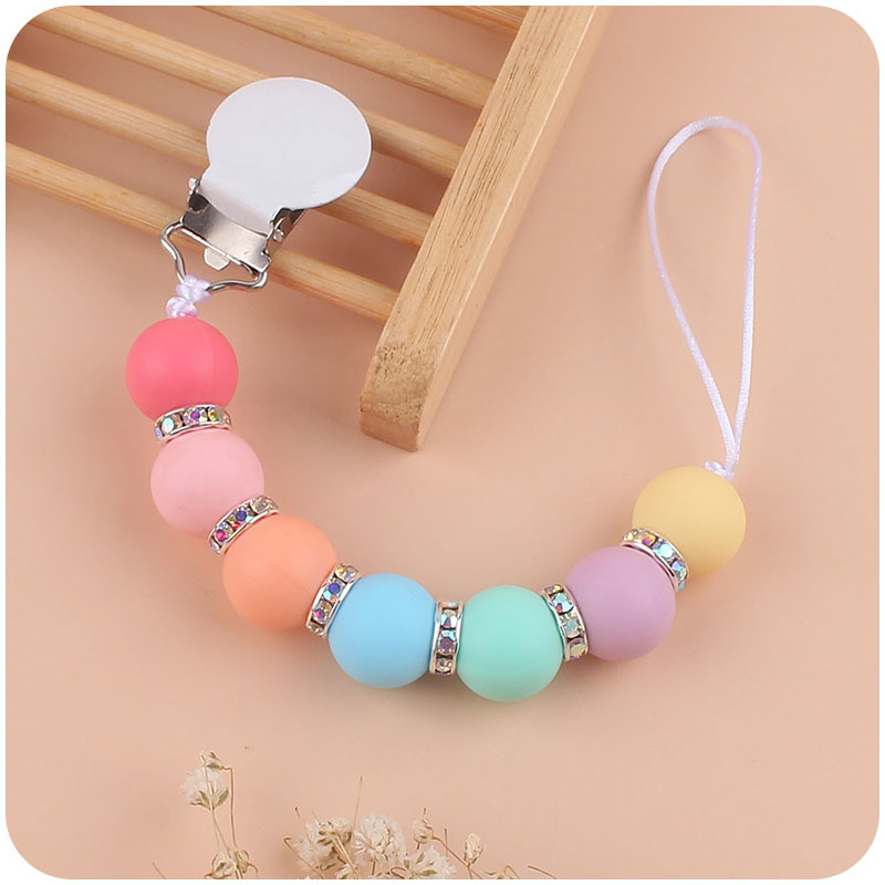 Nuevos suministros para bebés chupete cadena creativa DIY colorido agua ladrillo intermitente chupete cadena anti-caída