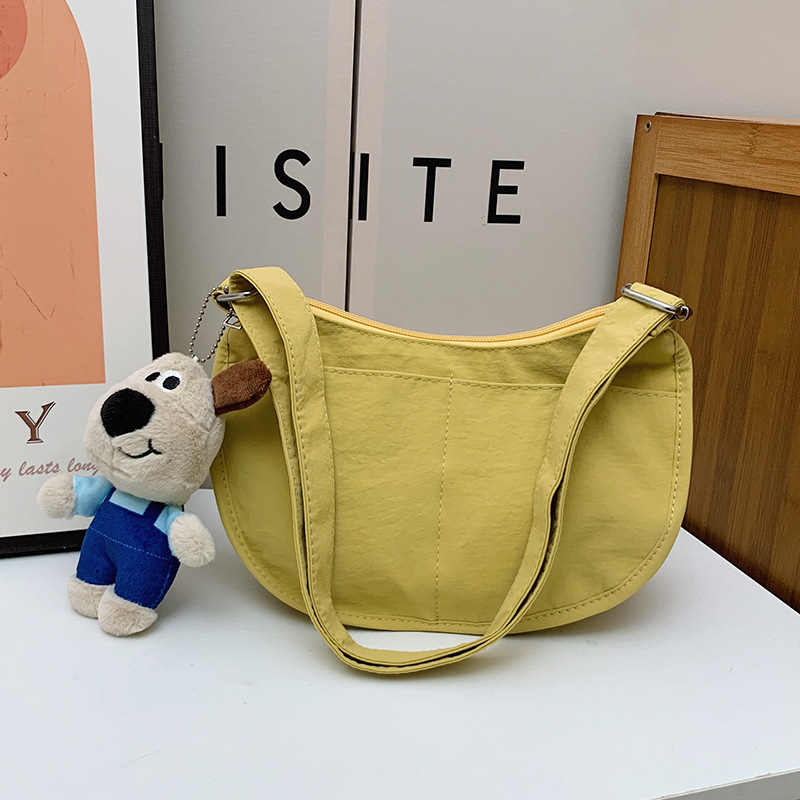 Bolsa de hombro coreana para niños y niñas de color sólido de gran capacidad bolsas de饺os para niños 2025 nuevas bolsas para niños con colgantes