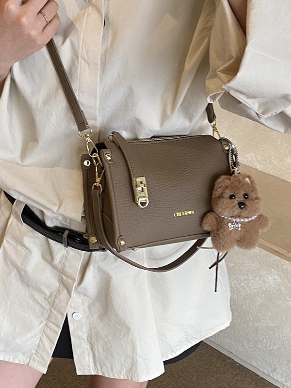 Bolsos retro retro de alta calidad para mujeres 2026 nueva textura lichi bolso pequeño estilo coreano simple mochila de hombro