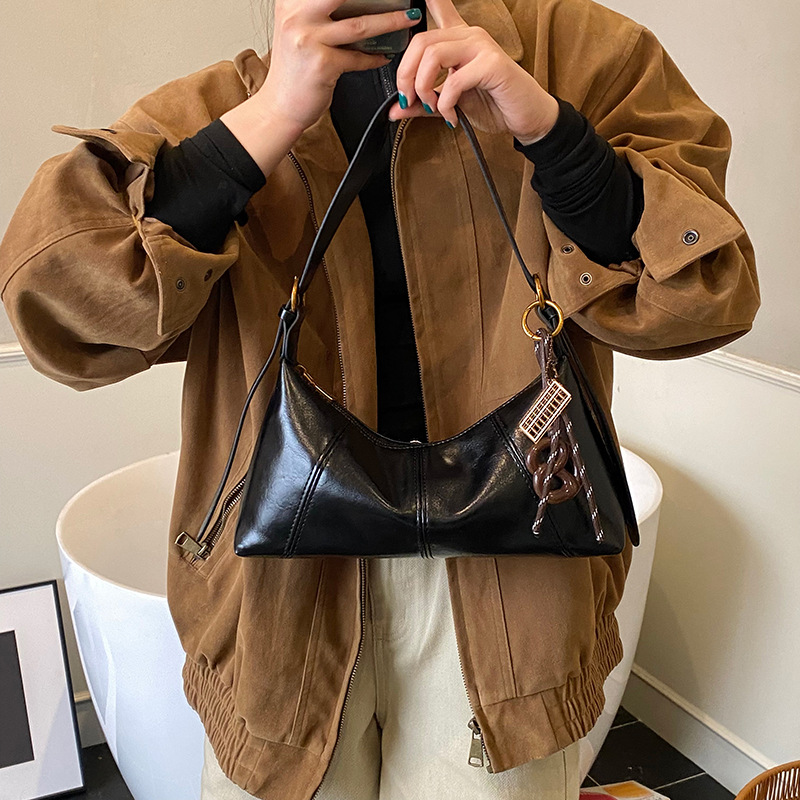 Bolso de brazo de nicho coreano, bolso de palo de mujer 2025, otoño y invierno, nueva moda, bolso de hombro de viaje al trabajo