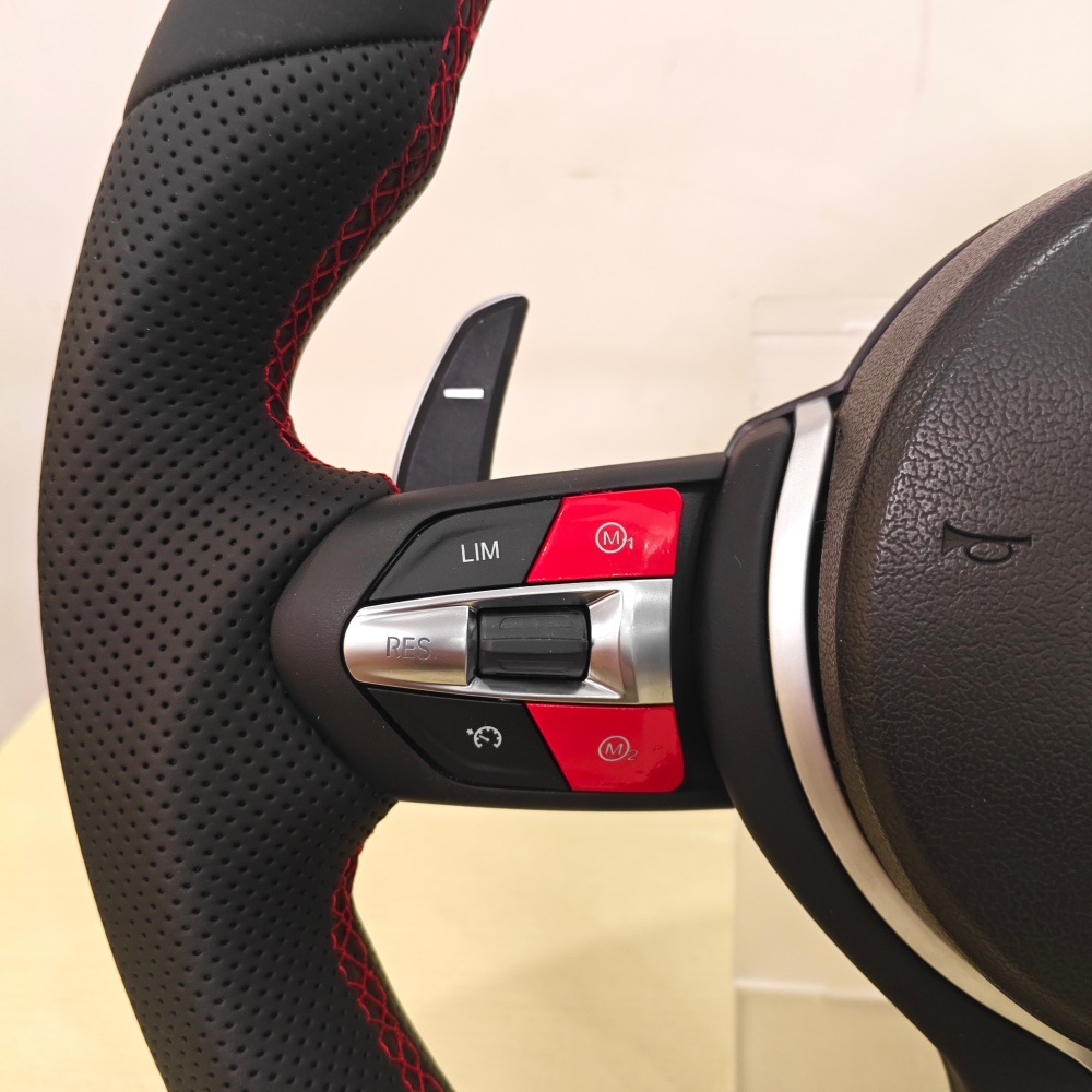 New red button with stitching alignment suitable for all BMW models, including the F10, F30, E90, and E92 steering wheels