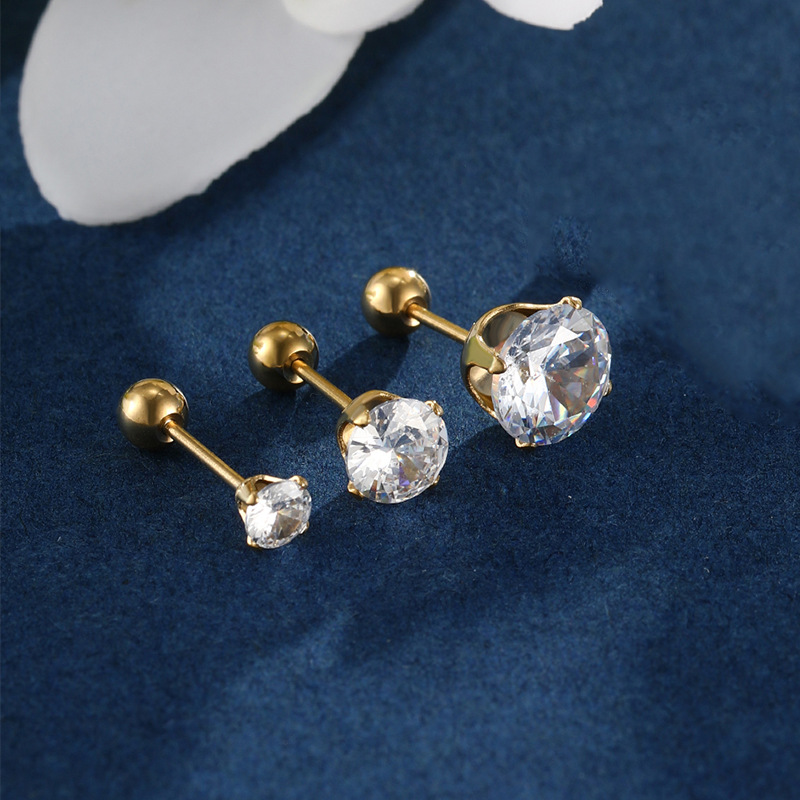 Joyería de Xuping de acero inoxidable tornillo torcedura hebilla de cuatro garra pendientes de la personalidad de la moda japonesa y coreana pendientes de Gema artificial azul