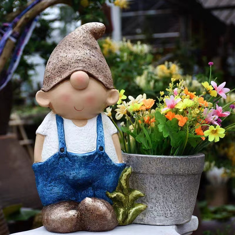 Little boy flower pot