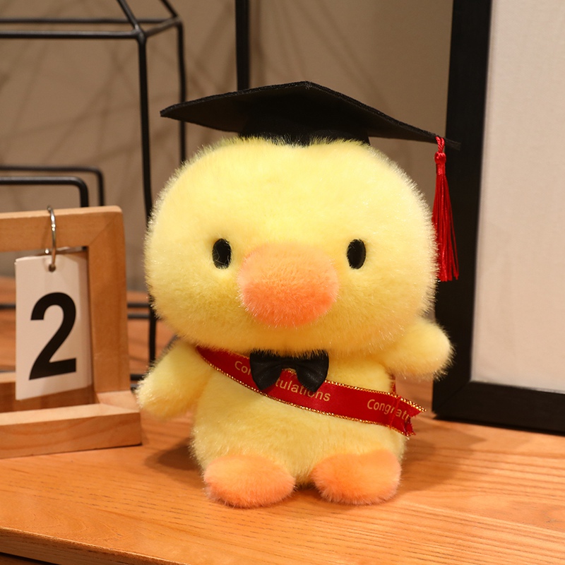 Cute Dr. Pato muñecas juguetes de peluche muñecas de tela muñecas estudiantes regalos de graduación con logotipo