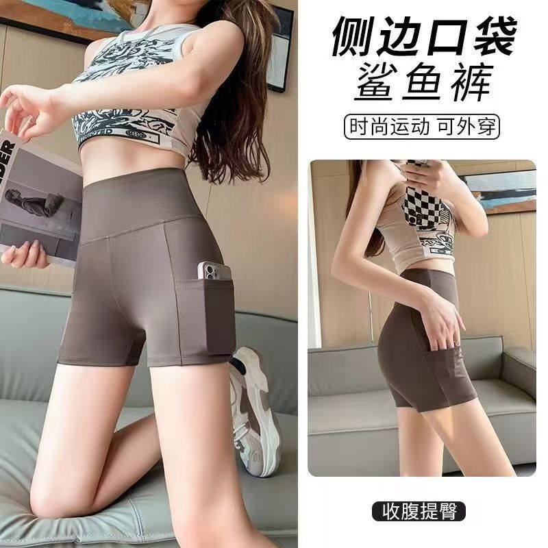 Nuevos pantalones de bolsillo de tiburón leggings para mujeres desnudas tres puntos de cintura alta pantalones de seguridad abdominales ajustados pantalones cortos de yoga adelgazantes