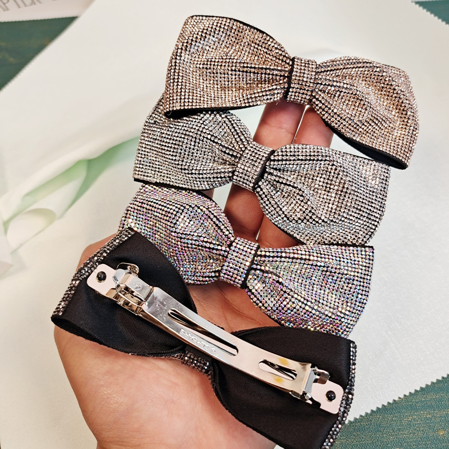 新款秋冬韓國蝴蝶結滿鑽彈簧夾髮夾高級輕奢布藝領結水鑽發卡髮飾