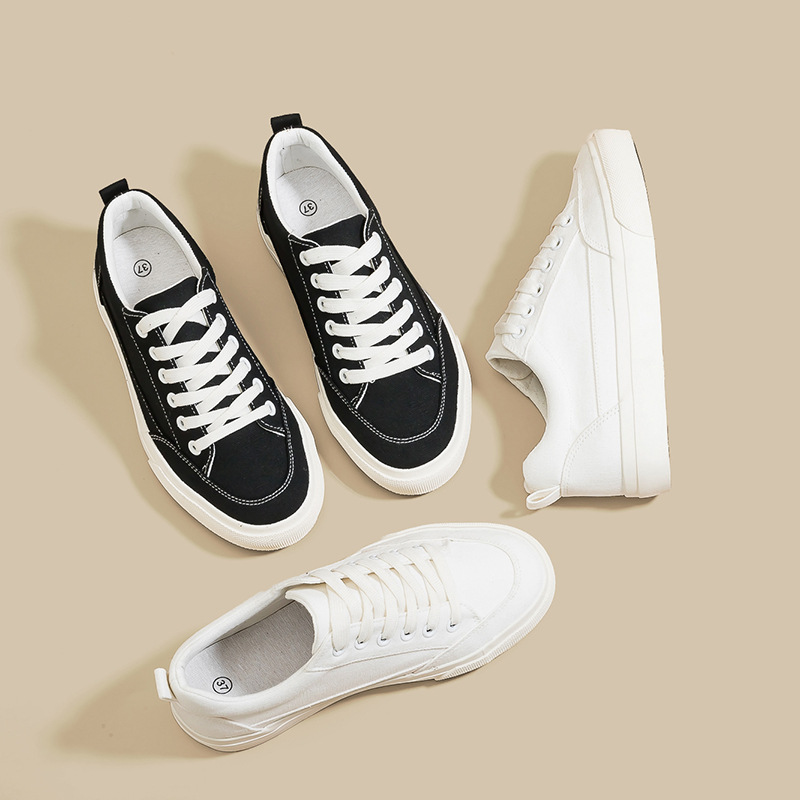 Zapatos blancos de pareja primavera nuevos zapatos casuales de mujer, zapatos de skate de altura baja zapatos de lona zapatos blancos al por mayor