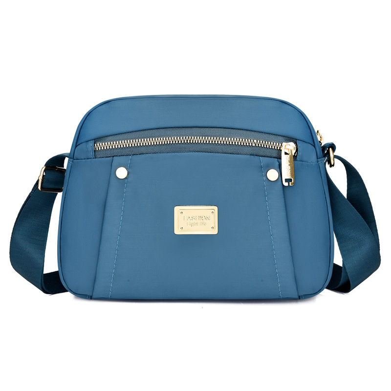 Bolsa de mensajero de tela Oxford para mujer 2023 nueva primavera de mediana edad para mujer bolsa de viaje de gran capacidad hombro nylon madre bolsa todo a juego