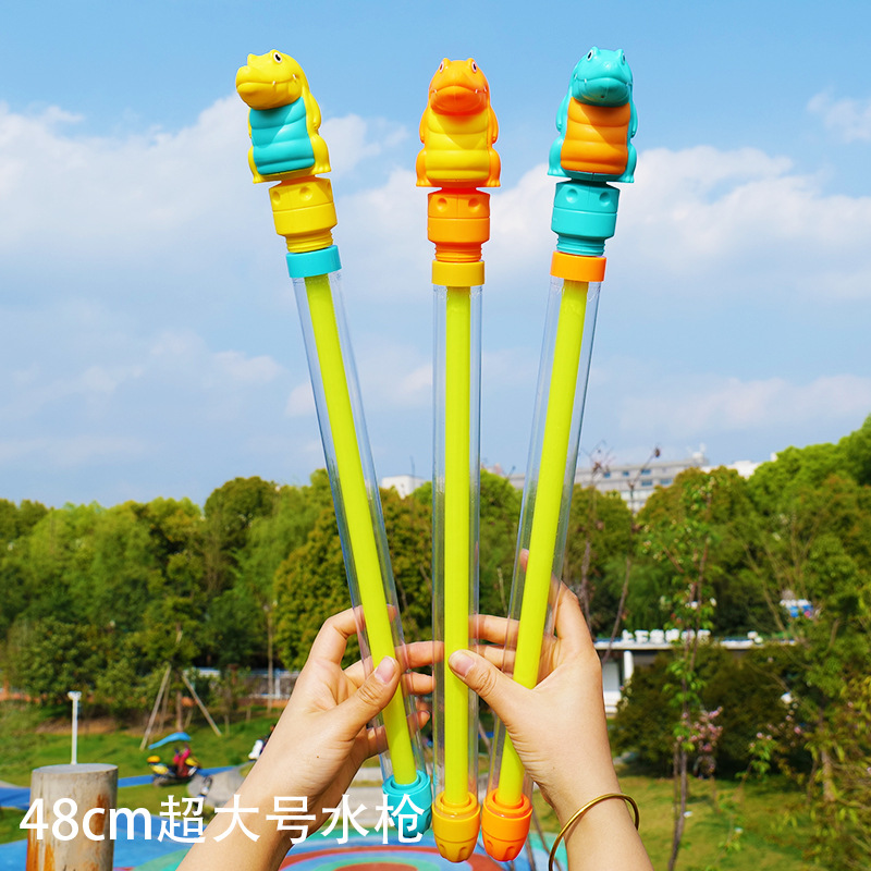 Juguetes del día de los niños Pistola de agua de dibujos animados tipo de extracción de agua de gran capacidad para niños y niñas jugando en la playa juguetes de agua al por mayor