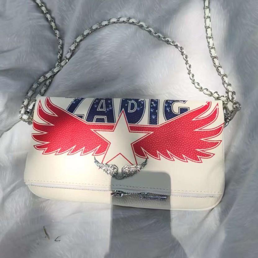 zv transfronterizo impresión inglesa damas de cuero PU cremallera larga multi-tarjeta de mano para llevar dinero brazo de ala taladro caliente