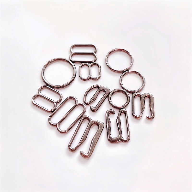Botón de ropa interior de metal en stock, aleación de zinc de plástico, sujetador redondo en forma de octeto y nueve, botón de ajuste de cintura de hombro.